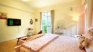 A bedroom with a bed, a bedside table, a mirror, a TV, and a window with curtains. - Provence Villa (Nanzhuang)