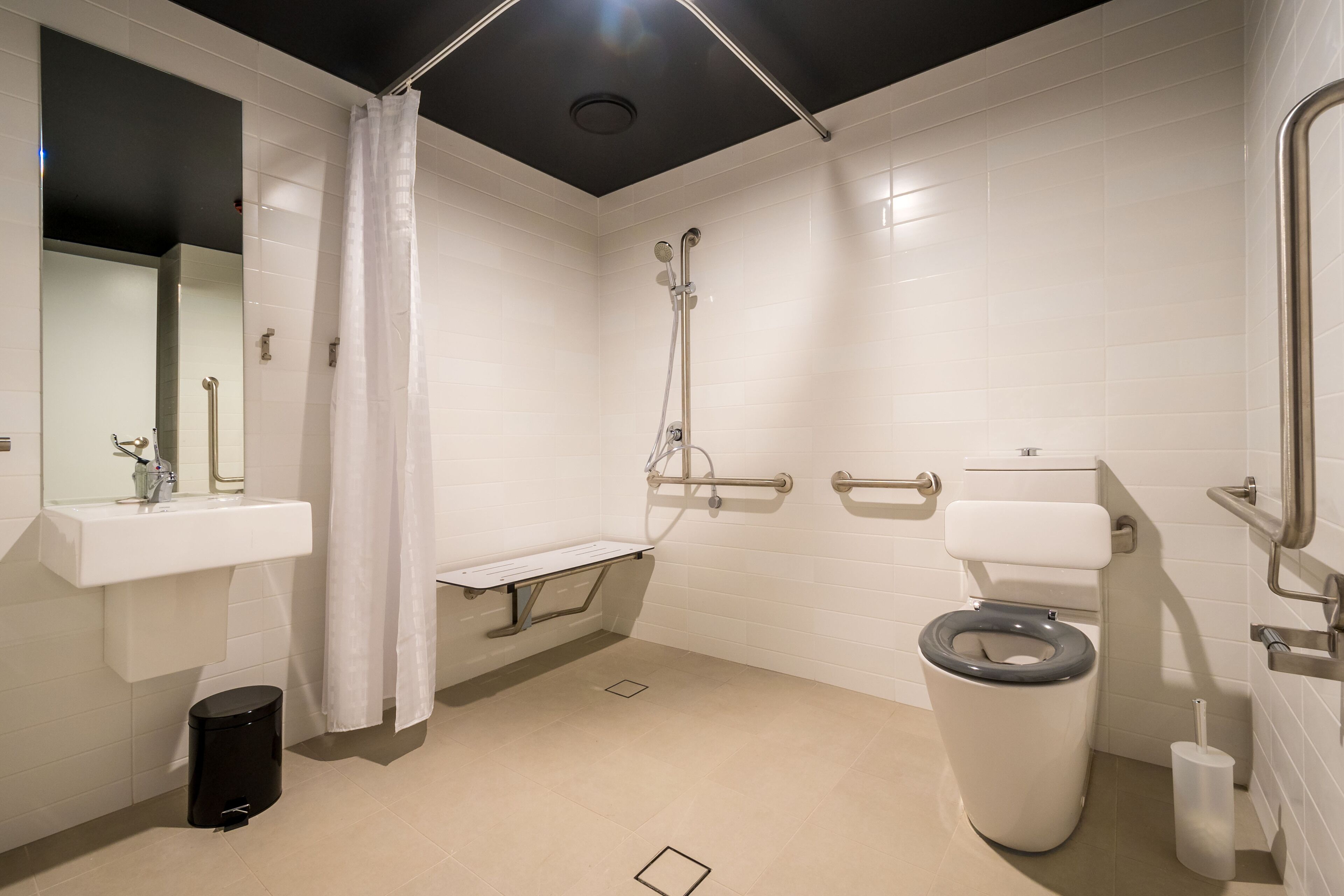 accessible room - free mini golf | bathroom | shower, free toiletries, hair dryer, towels
