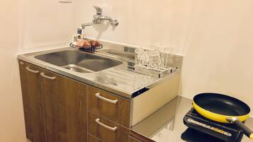 Standard Family Room | Private kitchenette | Fridge, microwave, stovetop, electric kettle