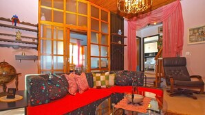 A cozy living room with a sofa, armchair, and glass coffee table. - House 1461/13494 (Istria - Pula), 4500m from the beach (Pula)