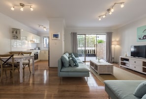 Appartement exécutif | Aire de séjour | Téléviseur