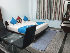 Quarto luxo | Área de estar | TV