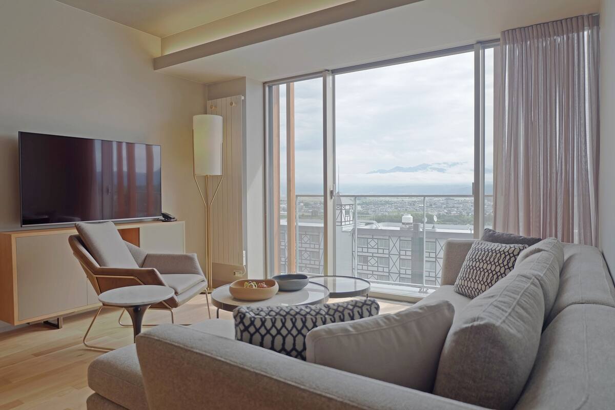 2 Bedroom Suite | Living room | 40-inch Smart TV with satellite channels, Netflix, streaming services