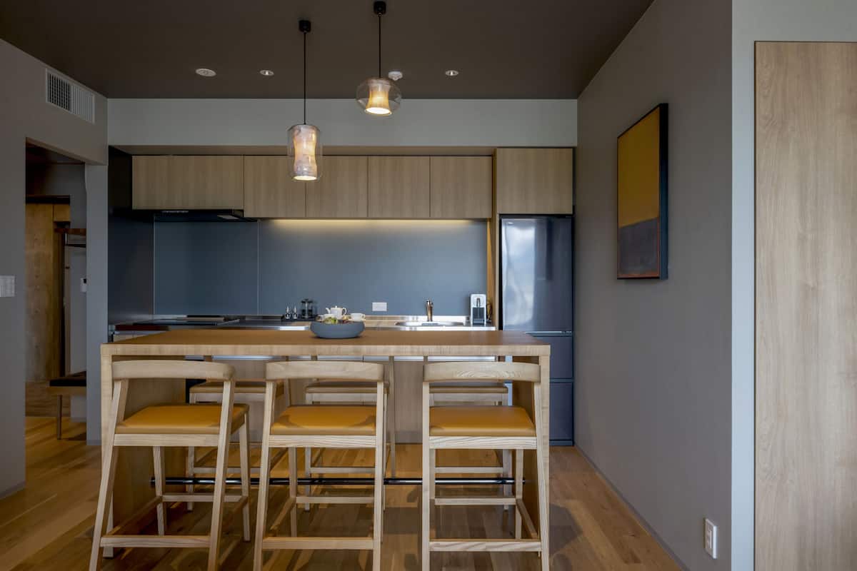 mini-fridge, espresso maker, dining tables