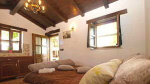 A bedroom with a bed, pillows, a wooden ceiling, a window, and a view of the outside. - Apartment 1655/17138 (Istria - Matohanci), 9000m from the beach (Matohanci)