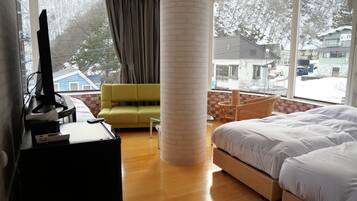 Deluxe Room (for 4 Guests, Western Style) | Down comforters, free minibar, in-room safe, individually decorated