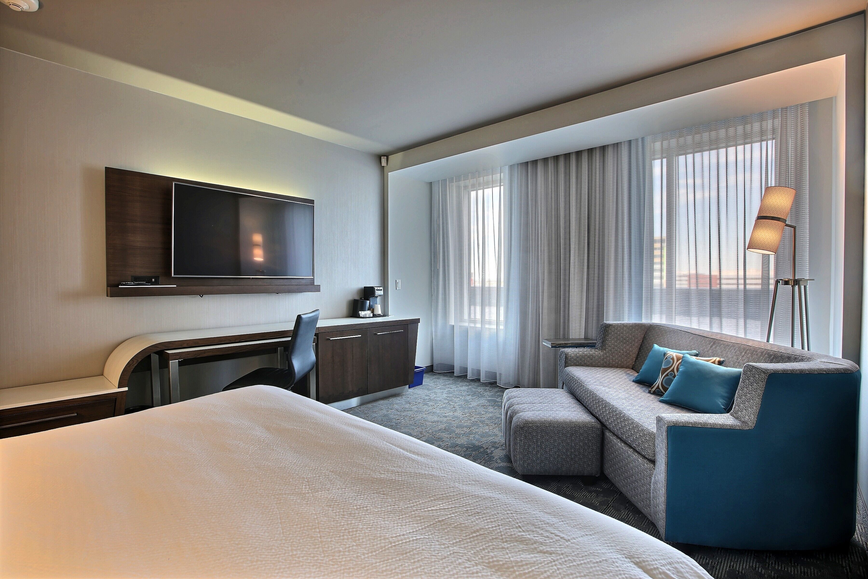 room, 1 king bed with sofa bed | hypo-allergenic bedding, desk, laptop workspace, blackout curtains