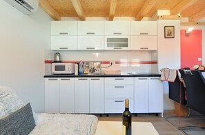 Fridge, microwave, stovetop, cookware/dishes/utensils