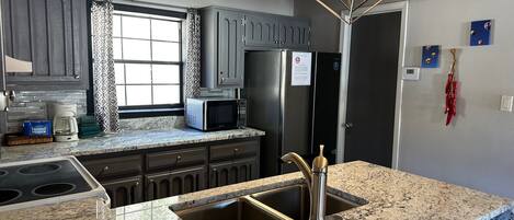 Forno, piano cottura, lavastoviglie, macchina per tè/caffè