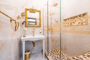 Hair dryer, towels, shampoo, toilet paper