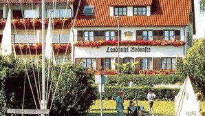 A hotel with a red-tiled roof and a sign reading "Landhotel Wodenee". - Landhotel Bodensee (Konstanz)