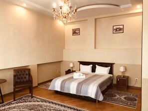 Junior Suite | Blackout drapes, iron/ironing board, free WiFi
