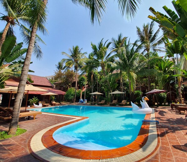 Outdoor pool, open 8:00 AM to 10:00 PM, pool umbrellas, pool loungers