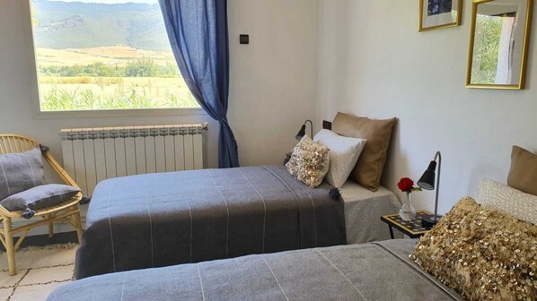Blackout curtains, iron/ironing board, free cots/infant beds