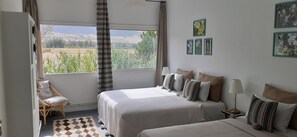 Blackout curtains, iron/ironing board, free cots/infant beds