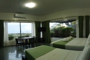 Family Room | Desk, rollaway beds, bed sheets