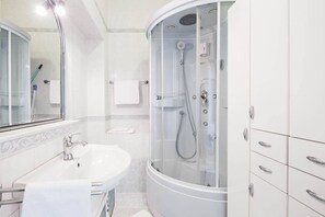 Panoramic Apartment, 1 Bedroom, Sea View | Bathroom | Shower, hair dryer, towels, soap