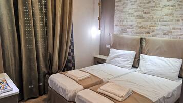 Deluxe Double or Twin Room | 1 bedroom, minibar, in-room safe, desk