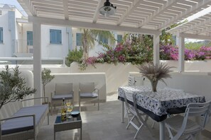 Outdoor dining - I Tre Golfi Isule Apartments Bilo on ground floor Apartment (San Vito Lo Capo)