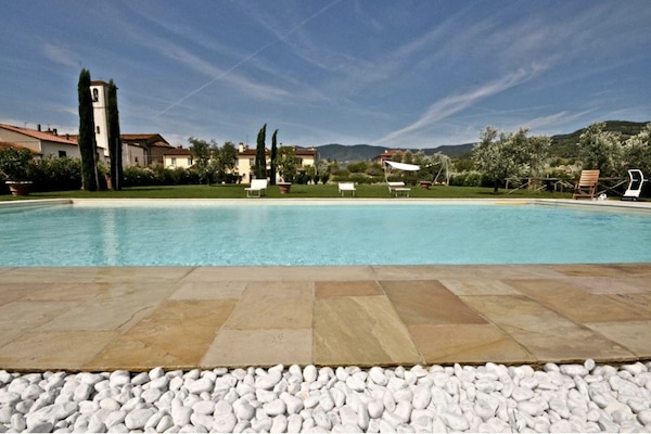 Seasonal outdoor pool, open 9:00 AM to 6:00 PM, pool umbrellas