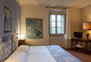 1 slaapkamer, donsdekens, een kluis op de kamer