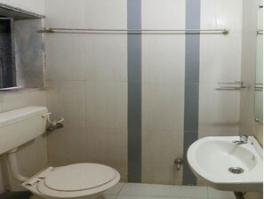 Shower, free toiletries, towels - Spot ON 60673 Patil Brothers Hotels And Resorts (Alibag)