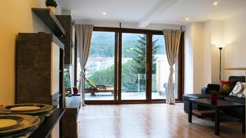 Romantic Apartment | Living room | Flat-screen TV