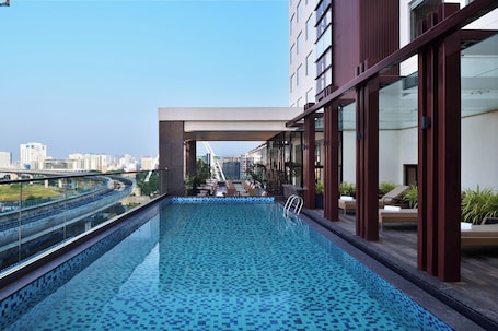 Outdoor pool, open 7:00 AM to 8:00 PM, sun loungers