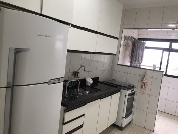 Microwave, coffee/tea maker, blender, cookware/dishes/utensils