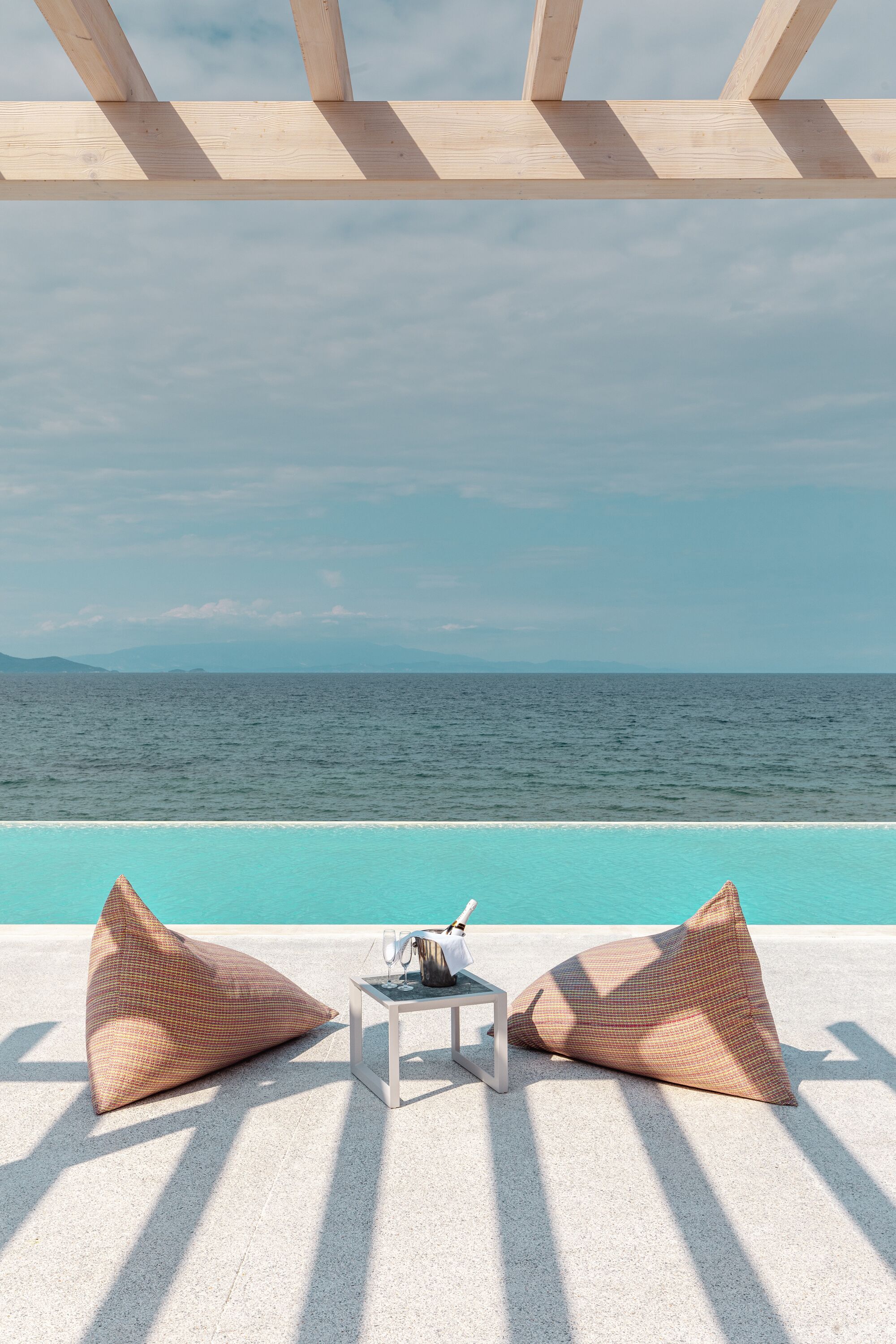 seasonal outdoor pool, pool umbrellas, pool loungers