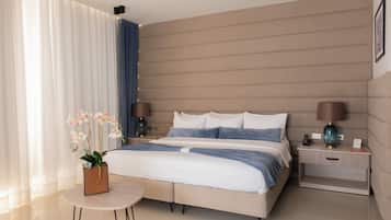 Desk, laptop workspace, blackout curtains, free WiFi