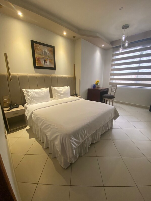 Room, 1 Queen Bed | Desk, laptop workspace, blackout curtains, free WiFi