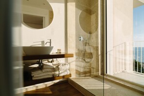 Junior Suite, Sea View | Bathroom | Free toiletries, hair dryer, bathrobes, slippers