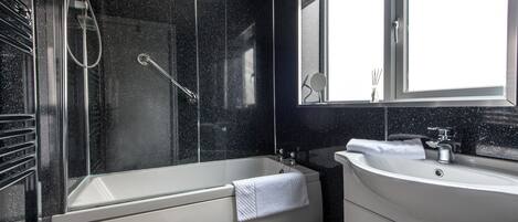 House, 2 Bedrooms | Bathroom | Combined shower/tub, towels, soap, toilet paper