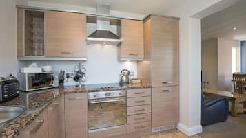 Apartment | Private kitchen | Fridge, microwave, oven, stovetop