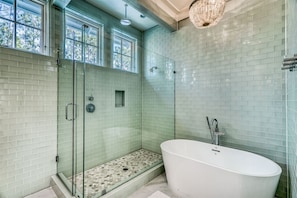 Combined shower/tub, hair dryer, towels, soap