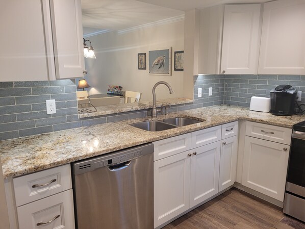 Fridge, microwave, oven, stovetop - Oceanview from balcony 3 Bedroom 2 Bath ground floor Unit - 110 (ST. AUGUSTINE)