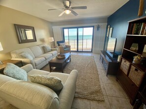 Flat-screen TV, DVD player, books