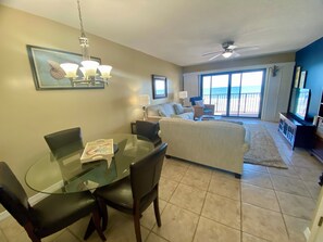 Flat-screen TV, DVD player, books