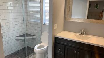 Combined shower/tub, hair dryer, towels, soap