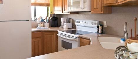 Fridge, microwave, oven, stovetop