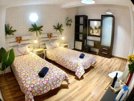 Economy Double Room, Private Bathroom | 1 bedroom, in-room safe, blackout drapes, iron/ironing board