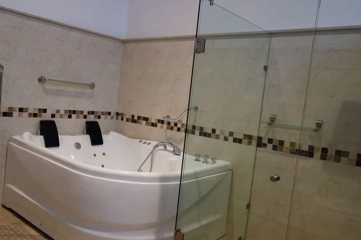 Habitación Deluxe | Regadera en el baño