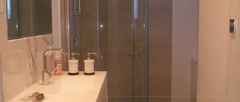 Hair dryer, towels, soap, shampoo