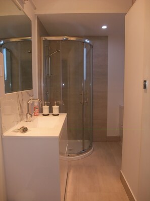 Hair dryer, towels, soap, shampoo