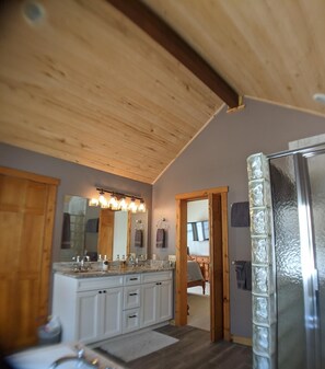 Combined shower/tub, hair dryer, towels, soap