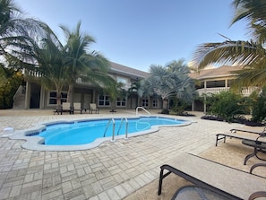 Outdoor pool - The Alexander Suites #101 - Queen Suite (West End)