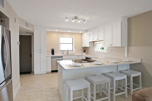 Fridge, microwave, oven, dishwasher - Upscale and Chic top floor condo in Island Complex (Marco Island)