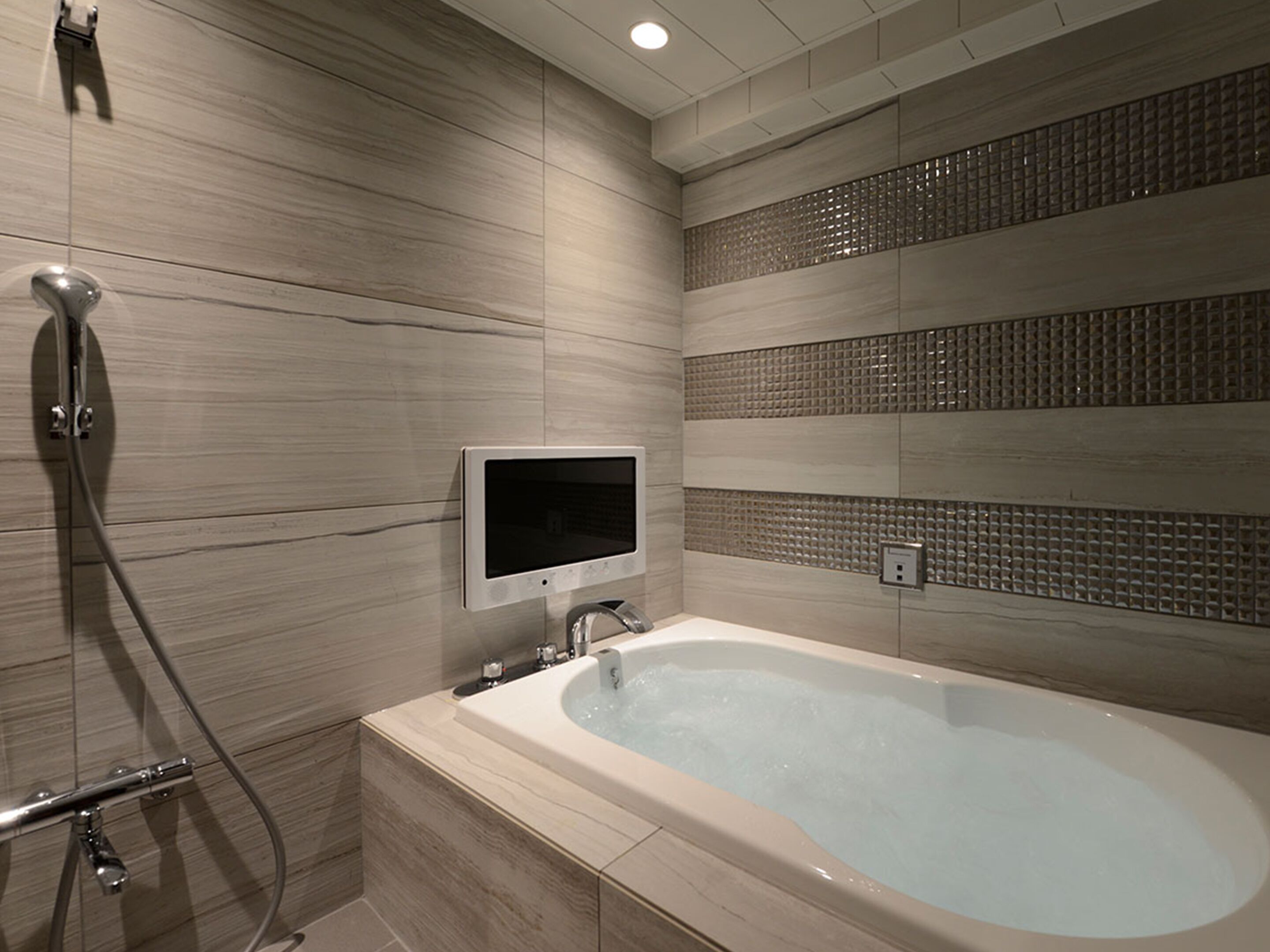 hair dryer, slippers, electronic bidet, towels