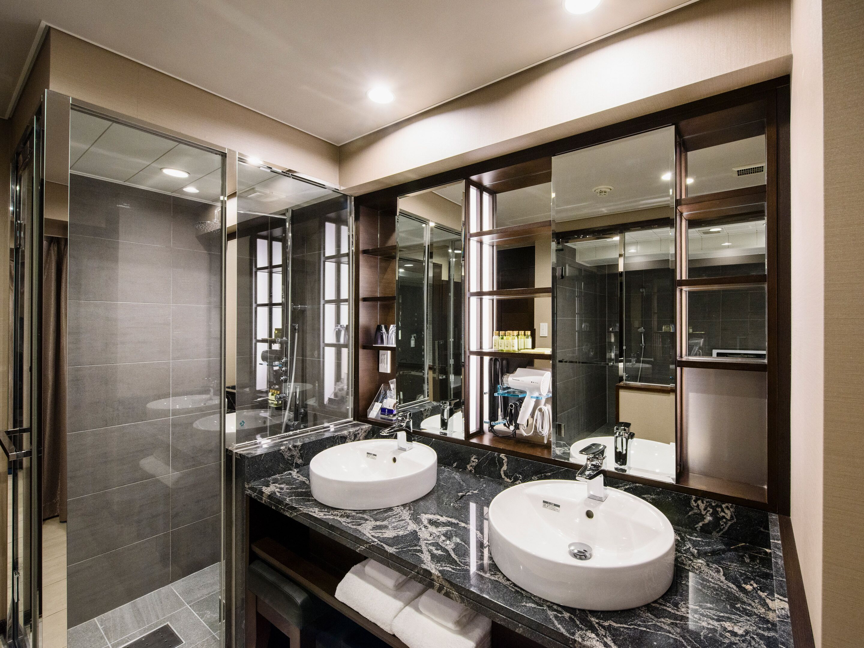 hair dryer, slippers, electronic bidet, towels